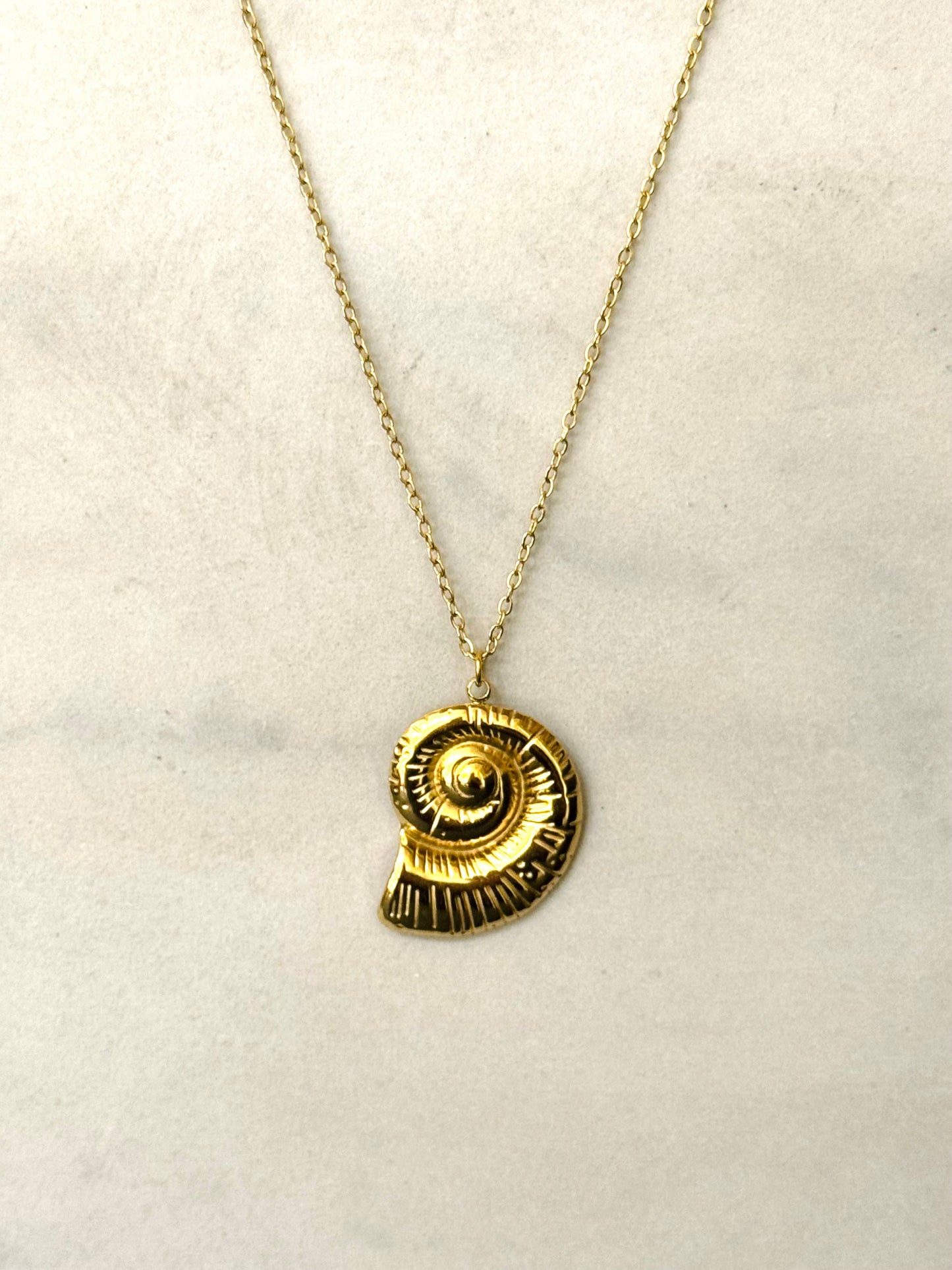 Halsband spiralformad snäcka