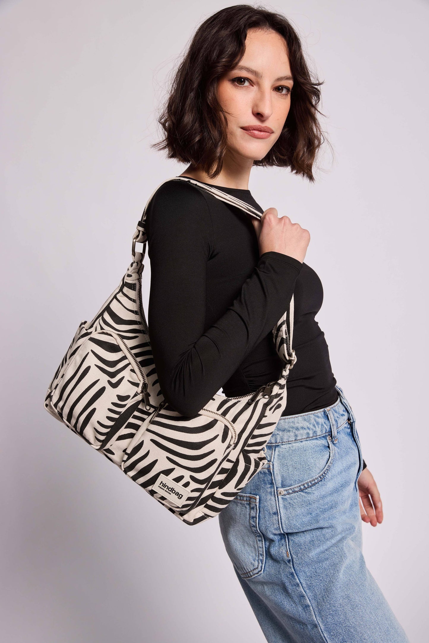 Multipocketväska Emile Tiger off-white